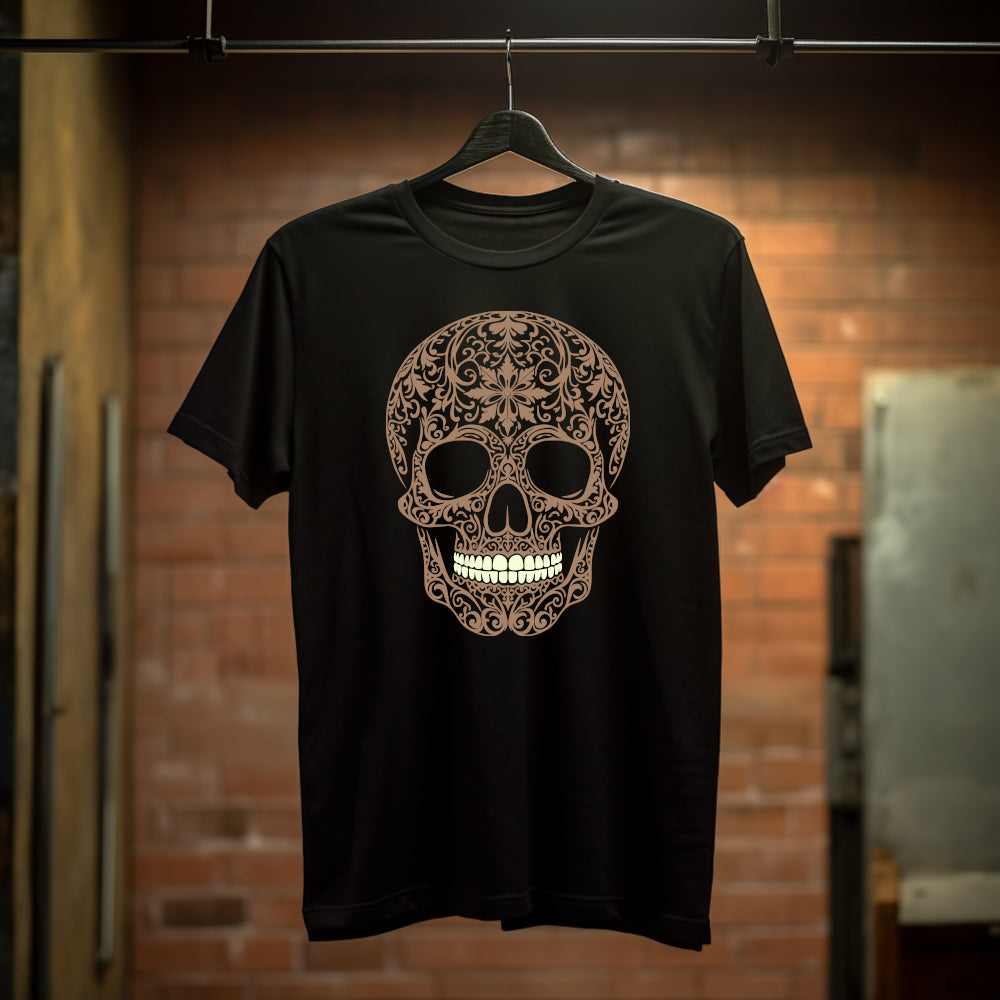Black t-shirt with a large intricately cut light brown skull with contrasting whitish teeth