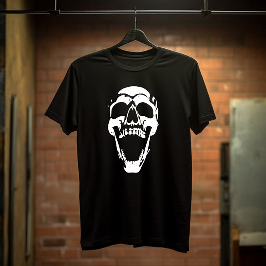 Black t-shirt with a large open-mouthed skull illuminated dramatically from below