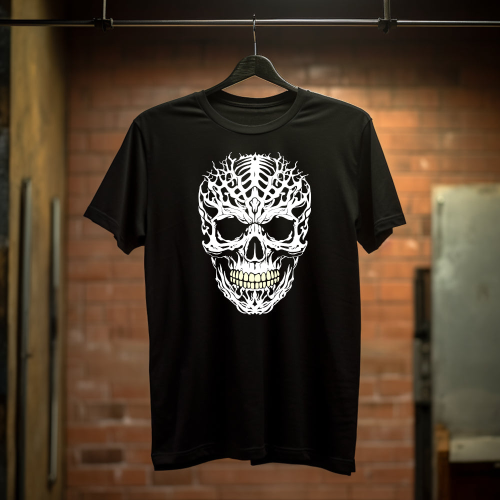Black t-shirt with a large intricately cut spiky white skull  with yellowing teeth